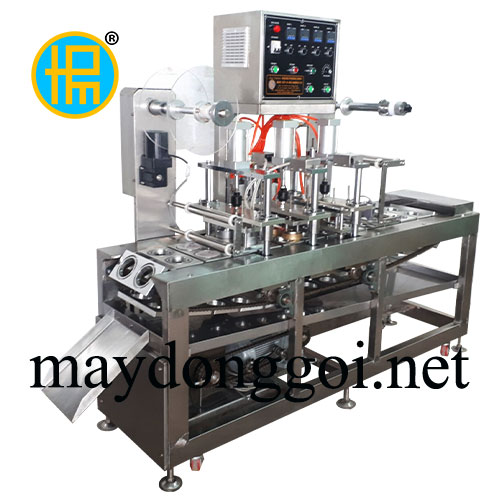 Máy dán – cắt miệng ly cồn thạch (băng tải)